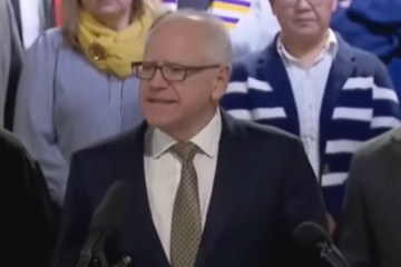 Tim Walz speaking at a public event