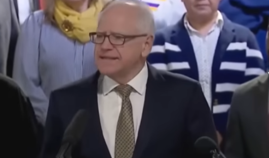 Tim Walz speaking at a public event