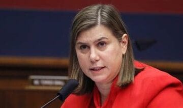 Senator Elissa Slotkin speaking at a podium