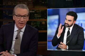 Bill Maher speaking on a television set.