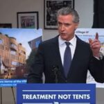 Gavin Newsom speaking to reporters