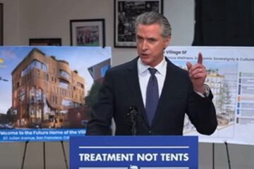 Gavin Newsom speaking to reporters