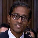 Gavel and U.S. flag representing federal court decision