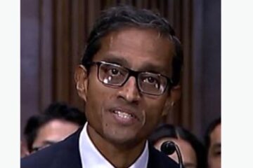 Gavel and U.S. flag representing federal court decision