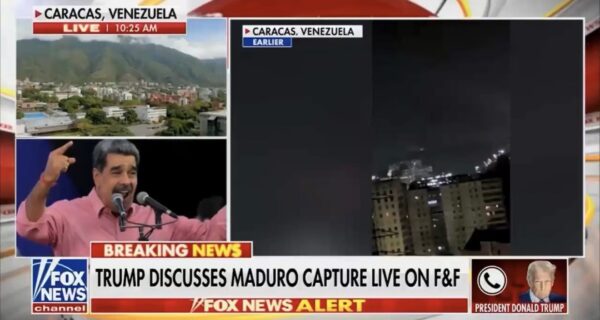 President Trump speaking with Caracas skyline in background