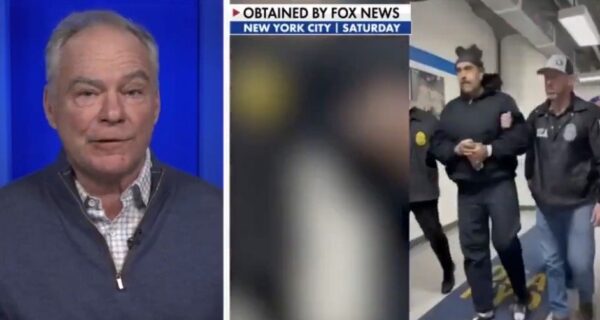 Tim Kaine speaking during a news segment, with a blurred image of a person being escorted by law enforcement in New York City.