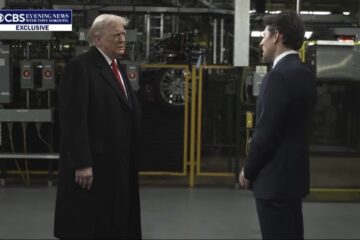 Karoline Leavitt speaking to reporters outside with a stern expression