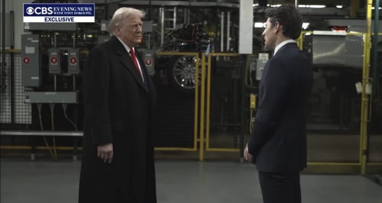 Karoline Leavitt speaking to reporters outside with a stern expression