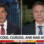 Protest scene with crowds at night