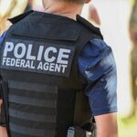 Crowd with American flags and fundraiser graphic representing online donations