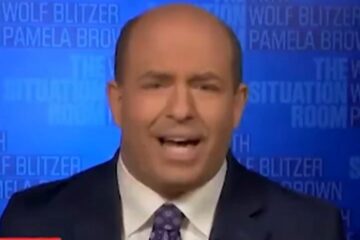 CNN studio with anchors and Paramount logo