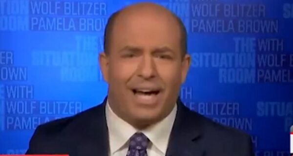 CNN studio with anchors and Paramount logo