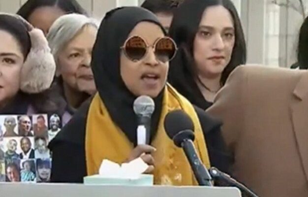 Rep. Ilhan Omar speaking at a podium