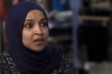 Ilhan Omar speaking at a town hall event