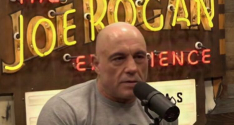 Joe Rogan speaking into microphone during podcast