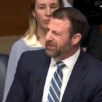 Senator Markwayne Mullin and Senator Bernie Sanders during Senate hearing