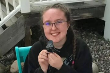 Police tape outside an apartment building in St. Cloud