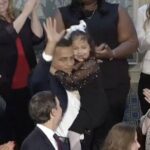 Portrait of Dalilah Coleman with family