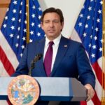 Florida Governor Ron DeSantis with New York City skyline