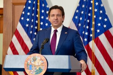 Florida Governor Ron DeSantis with New York City skyline