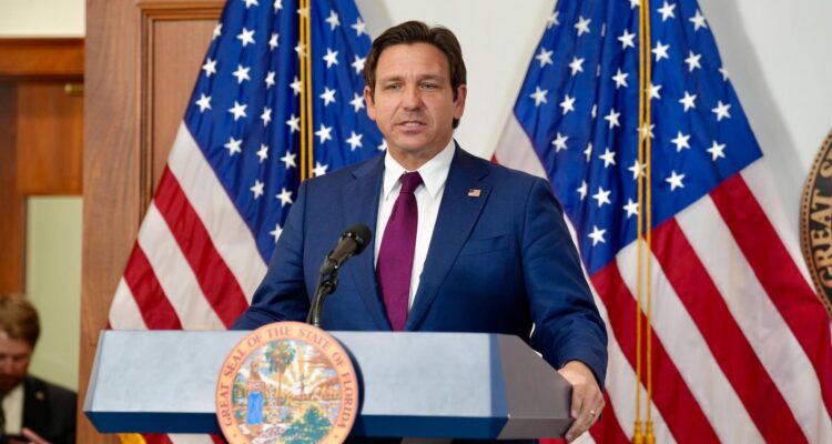 Florida Governor Ron DeSantis with New York City skyline