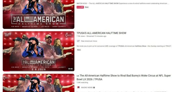 Crowd at TPUSA All-American Halftime Show with performers on stage