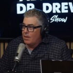 Adam Carolla speaking during a podcast appearance