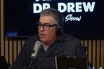 Adam Carolla speaking during a podcast appearance