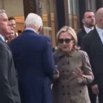 Bill and Hillary Clinton walking in New York City