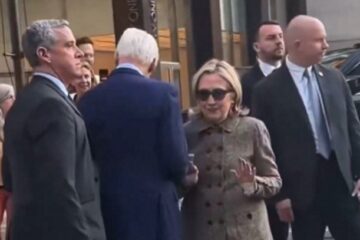 Bill and Hillary Clinton walking in New York City