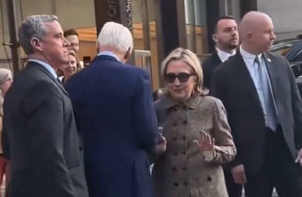 Bill and Hillary Clinton walking in New York City