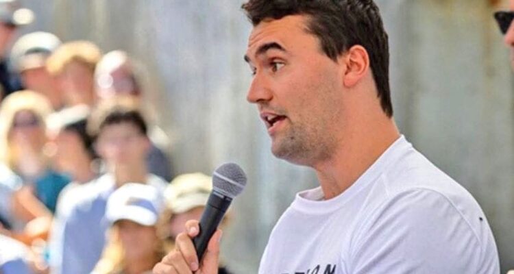 Memorial candles and flowers for Charlie Kirk