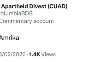 Columbia University campus building with students walking