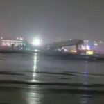 Airplane damaged on runway at LaGuardia after collision with firetruck