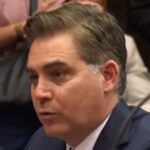 Jim Acosta speaking at a public event in Burbank