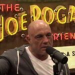 Joe Rogan speaking into a microphone on his podcast