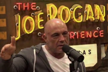 Joe Rogan speaking into a microphone on his podcast