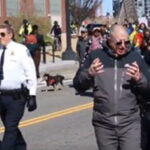 Protesters chanting 'Abolish the police' escorted by police in Washington, D.C.