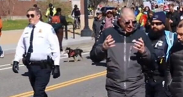 Protesters chanting 'Abolish the police' escorted by police in Washington, D.C.