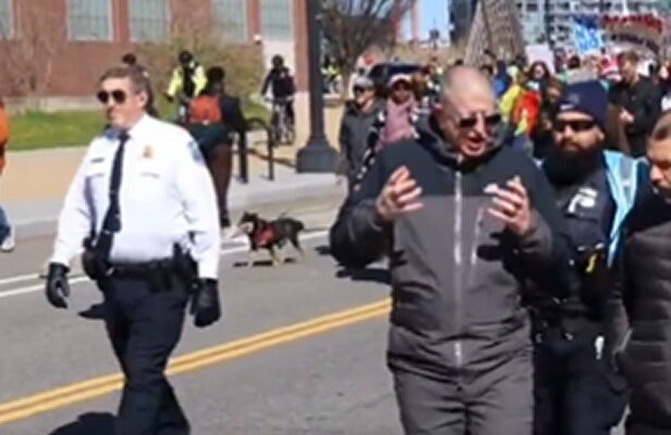 Protesters chanting 'Abolish the police' escorted by police in Washington, D.C.