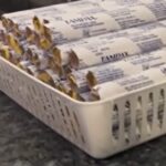 Maryland State Capitol exterior with protest signs