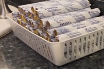 Maryland State Capitol exterior with protest signs