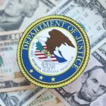 Gavel next to medical insurance card and pills