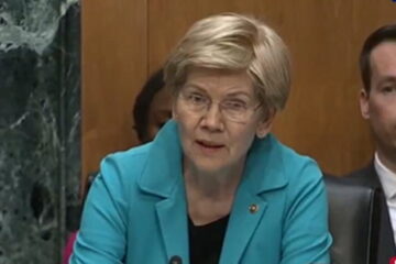 Kevin Warsh testifies during a Senate hearing as Elizabeth Warren questions him