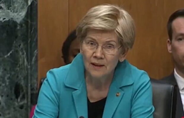 Kevin Warsh testifies during a Senate hearing as Elizabeth Warren questions him