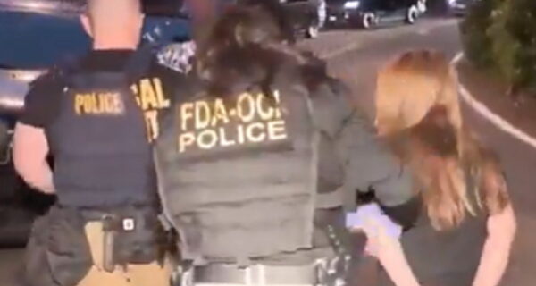 FBI agents conducting a raid at a hospice residence in San Dimas, California