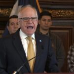 Tim Walz speaking at a public event