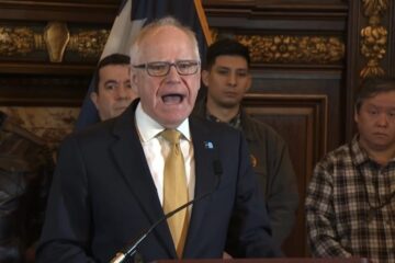 Tim Walz speaking at a public event