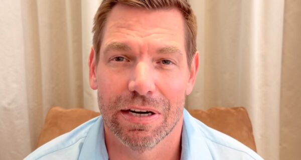 Eric Swalwell speaking at a podium