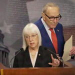 Senator Patty Murray speaking at a podium